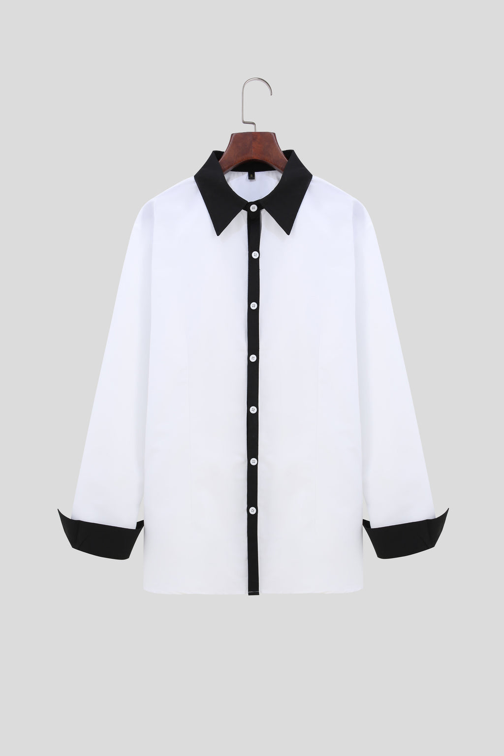 A Handsome Business And Fashionable Long-sleeved Shirt With Contrasting Colors For A Teenage Man